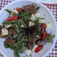 Salad with bread, tomatoes, aragula and other herbs and salads. And with a local type of cucumber typical for the region. at Raparossa  in Pezze Di Greco