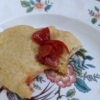 The starter: a crispy but chewy fried dough served with tomatoes and olive oil. at Raparossa  in Pezze Di Greco