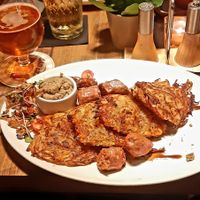 Beyond meat sausage with potato pancakes at Garage in Riga