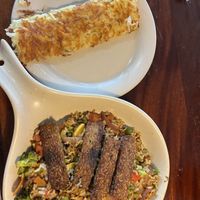 Tempeh scramble & hasbrown  at 43rd Street Deli in Gainesville