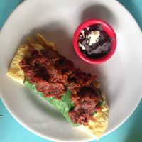Omelette with salsa. at Pan Comido - Roma Norte in Mexico City