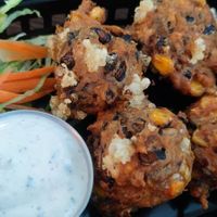 Cheesy fritters with beans at Atacolypse in Leipzig