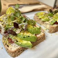 Avocado, tomato, micro greens, seeds, vegan home made parmesan, home made vegan cheese  at Nu Market & Coffee in Mallorca