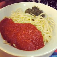 Espaguetis al pesto con tomate  at Amaltea in Barcelona
