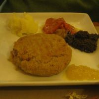 Burger entree.  The 'sides' look like baby food but they were seasoned well.  at Amaltea in Barcelona