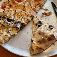 Vegan cheese, half tomato sauce half no sauce   at Wood Fired Pizza in Thomas