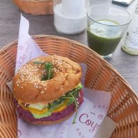 Vegan bagel and local juice at Coyote Coffee & Deli in Budapest