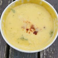 yellow peas soup cream with chili powder at Red Onion in Craiova