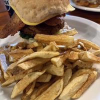 Stacker burger with homemade fries  at The Globe in Glossop