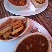 Chilli with tofu, veg steak n mushrooms in red wine, chips at The Globe in Glossop