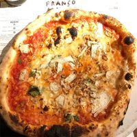 Vegan-friendly pizza with mushrooms .  at Franco Manca - Stoke Newington in North London