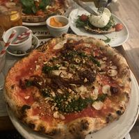 Vegan special - mushrooms, caramelised onions, organic tomato, spicy watercress pesto and roasted hazelnuts  at Franco Manca - Bermondsey in South East London