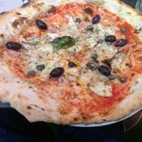 Salty olives and capers with vegan cheese at Franco Manca - Brixton in South West London