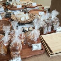 selection of baked goods - breads in foreground at Laze Oven 레이즈오븐 in Ansan
