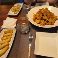 Chicken tariaki, spring roll, dumplings at Camouflage in Seoul