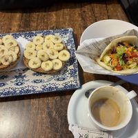 Toast with peanut butter and banana and Arepas Fresca  at Elvira 81 in Granada