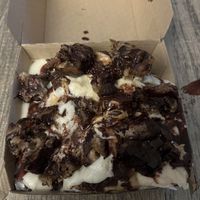 Build your own: roll w. cream cheese + PB frosting, banana bread, choco syrup, and mock “Reese’s cups"  at Cinnaholic in Ann Arbor