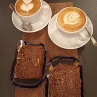 Almond cake, flat white, cappuccino at BELGA & CO in Brussels