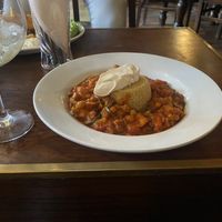 Spicy Moroccan Chickpea Tagine, Apricots & Raisins, Couscous, Oat Yogurt  at The Ship and Whale in South East London