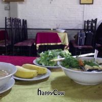 Some plates and the tables at Bo De Quan - Ho Tung Mau in Vinh