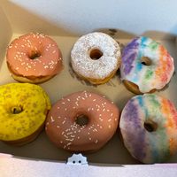 Top left and bottom middle: Strawberry Milkshake
Bottom left: Pear Cardamom
Top middle: French Toast
Right: Pride (vanilla with rainbow glitter I think) at Dough Joy - East Pike Street in Seattle