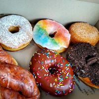 Cinnamon twist, French toast, Pride, chocolate frosted, choco-filled churro, cookies 'n' cream (Each one is HUGE) at Dough Joy - East Pike Street in Seattle
