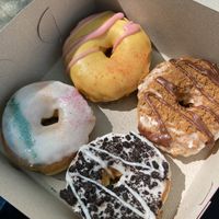 (Clockwise order, starting top left) Strawberry lemonade, Vanilla Biscoff, Cookies&Cream, Pride at Dough Joy - East Pike Street in Seattle