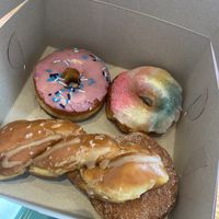 Strawberry Milkshake, Pride Donut, Glazed Sea Salt Twist, and (hidden) seasonal donutts  at Dough Joy - East Pike Street in Seattle