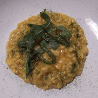 Riso Carnaroli della Riserva San Massimo mantecato alla carota, pesto di erbe e rucola selvatica at Polisena L'Altro Agriturismo in Pontida