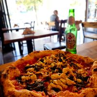 Vegan pizza with mushrooms, artichoke and friarielli. at Pizzarte in Tirana
