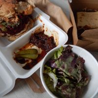 takeaway Super Burger with salad, vegan carrot cake at Anusia Cafe in Tring