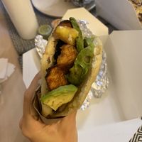 Vegan black arepa—avo, sweet plantains, and black beans  at Arepa Grill Atlanta in Doraville