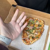 Just my hand for scale and the $12 naan. I would highly suggest getting the vegan cheese sticks instead    at Pizza Twist in Morrisville