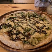 Is that my face? Is that Pizza? It's both!  at Earthly Kitchen in San Jose