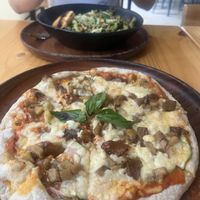 Soft doughy pizza & undercooked old pasta. Yum   at Earthly Kitchen in San Jose
