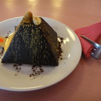 Vegan chocolate dessert with nougat and peanut butter centre. Tastes a little like a Snickers bar. Rich and one to share! at Ohlala in Berlin