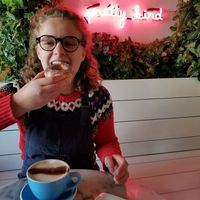 chai latte with oat milk and blueberry donut at Pretty Bird Coffee Roasters in Yardley