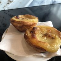 Pastel de nata sprinkled with cinnamon.   at Vegan Nata in Amadora