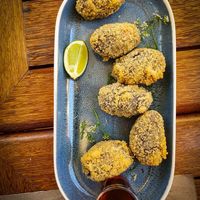 croquete de feijoada, acompanha melaço at Casa Patuá in Fortaleza