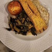 Eggplant "catfish", collard greens,  grits, and a jalapeño cornbread muffin. Yummm! at Public House in Ferndale