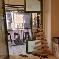 Inside space and ouside tables at PLANTE Lab in Catania