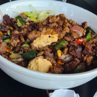 Vegan bowl with cheese and crumbles at Plaza Azteca in Kill Devil Hills