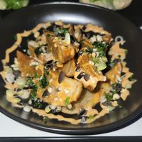 Peruvian fries with vegan chili scallion sauce at Seawiches Lounge Bar in Roatan