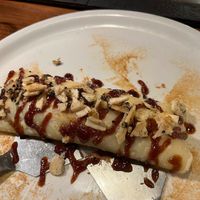 Vegan crepe with anko and vanilla soy ice cream filling, kinako, date syrup and fried rice cracker/sesame on top - 1,000,000% recommend! at TEPPANYAKI RAI in Ninohe
