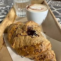 Soy cappuccino, vegan croissant with hazelnut cream at Rosebymary in Milan