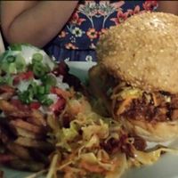 Loaded fries with pulled pork burger at The Hogtown Vegan in Toronto