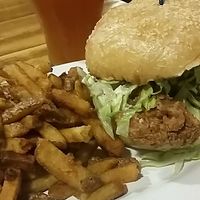 Unchicken with fries and homemade ice tea at The Hogtown Vegan in Toronto
