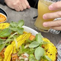 Seasonal “tacos” with turmeric/coconut shell  at Nightshade in Vancouver
