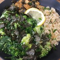 Bowl with rice, marinated tempeh and vegetable at Paladares Vegan in Braga