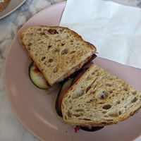 Not-on-the-menu vegan sandwich (cucumber, beet, sauerkraut, and spicy chili sauce) at Voyageurs Bakehouse in Appleton